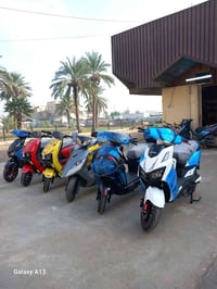 معرض قاسم العامري لبيع الدراجات النارية والشحن بغداد /الشعلة /قطاع الس...