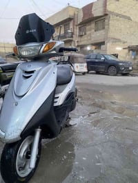 دراجه اكزز مكينه ممفوحهً بين قوسين كفاله مصارله هواي من نازله بيه اورق...