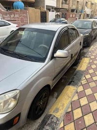 كيا ريو موديل ٢٠٠٩ وارد امريكي بدون ضربه مضبوغه حزام  اثر جراد سياره ح...