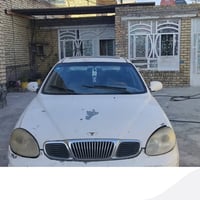 دايو لكنزا موديل 2000  گير أوتو مكينة مسكر 2000 (چبة گايمة)  رقم بغداد...