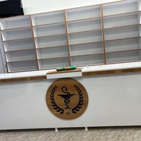 صيدليه للبيع كامله من كلشي سبب البيع ضرف مالي لم تفتح بعد موقع مميز جد...