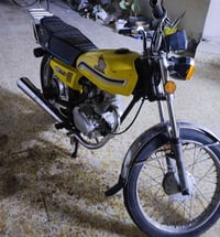 دراجة • محرك • قابل للتفاوض