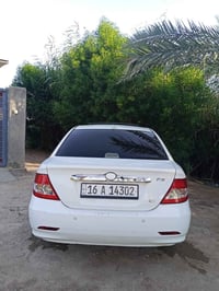 BYD. F3موديل 13 رقم قادسيه سياره جاهزه محرك لانسر الاسود قبل شهر من شد...