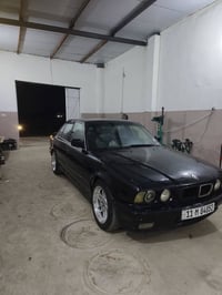 BMW 520i 1991 مكينة 6 مسكر عدلة  رقم بغداد انكليزي  فحته + كشنات جلد  ...