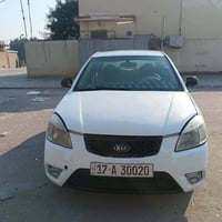 كيا ريو ٢٠١١ بيضاء اللون  رقم انكليزي بسم راعيهه مصبوغه حزام  امتجايه ...