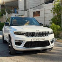 جيب كراند شيروكي سومت هايبرد الموديل : 2022 امريكي  المحرك : 4000 تيرب...