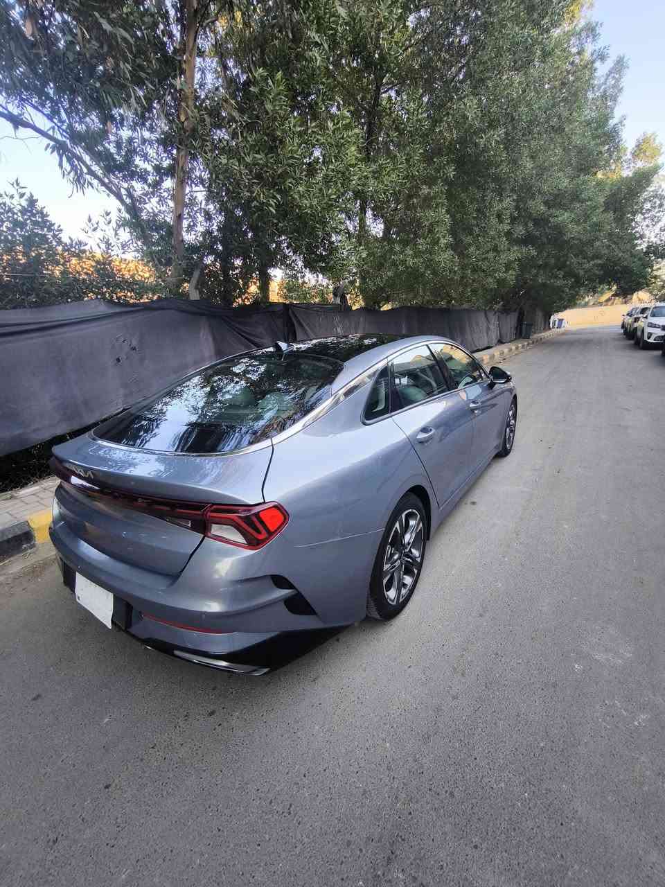 كيا 2022 K5 EX لون معدني فول مواصفات واحد على واحد اعلى فئة
 باقيلهة سنتين ونص وتصير حرة
السياره حادثهة فقط الجمالغ الخلفي جهة السائق .. ((حادث امريكا)) بدون شواصي بدون ايرباك كفالة
وبارد بسيط ((بالعراق)) نص شبر بالجاملغ الخلفي   
بدون ايرباك . 
بجم كبس 
ماشية67مايل
(منظومة غاز اضافة) قبل سنة  شديتهة ام الضمان (الدورة)
المواصفات EX فول 1/1. 
1- بصمة ابواب + تشغيل عن بعد. 
2- شاشة حجم كبير + داخل صاج ملكي. 
3- رادار امامي وجانبي وخلفي و بريك طوارئ وحساسات خلفيه. 
4- هاندبريك بصمة +ميموري كشن + تبريد وتدفئه كشنات وتدفئه استيرن + كشنات الاماميه كهرباااء.+شحن واير ليس. 
5- صندوق ذكي يفتح عند الاقتراب
6- بك لايت لد كامل. 
7- ويل كب  18
8- تبريد شاشة منفصل+ قطعتين تبريد. 
10- سياقة الكترونية + تحديد مسار.  
12-  نظام الترحيب الصوتي + الشاشات. 
13-  اناره داخليه لمس. 
14- تبريد شاشة منفصل. 
15- 4 وضعيات قيادة بل ماوس  
16-اوتو هولد للتوقف الالكتروني بل ازدحام. 
17- محرك 1600 turbo 🚀🔥
18-كامرة 360 درجة يعني خمس كامرات
كفالة كير محرك صدر تايرات سيارة جديدة مال جناي .
--معوقين بغداد--
ضمان الوكالة العامة والتحويل.. السيارة بيهة قسام شرعي كامل+ وكالة عامة
170 بيهة مجال بسيط  
مكاني 🌎 بغداد / م الصدر 
***********
