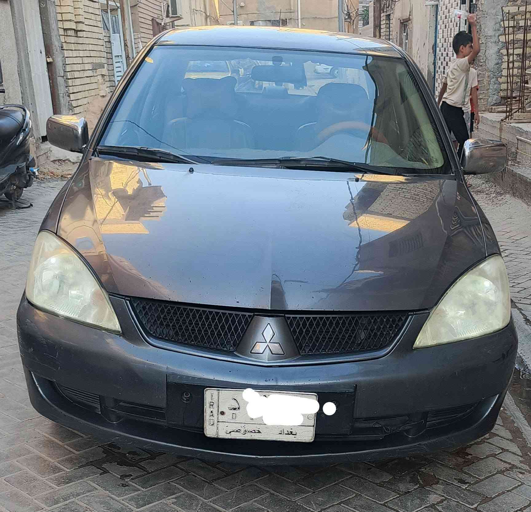 السلام عليكم لانسر موديل 2010  محرك 1500 للبيع خليجي الشركة العامة بأسمي السيارة بيها صبغ هلالات خلفية فقط اثر خياسات مكاني بغداد مدينة الصدر *********** 
السعر 76 وبيها مجال
