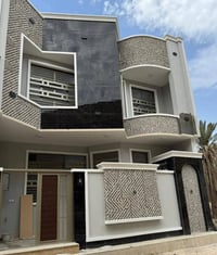 بيت 100 متر طابقين يم كباب بغداد 300متر عن النافورة البيت كله مرمر  غر...