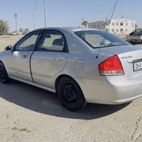 للبيع كيه سبكترا 2009 بلادي بس جلح بيها السياره رقم دوالي شرط التحويل ...