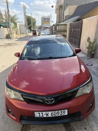 كامري موديل 2012 LE محسن فتحه وارد امريكي حادثها قطعتين جمالغ خلفي باب...