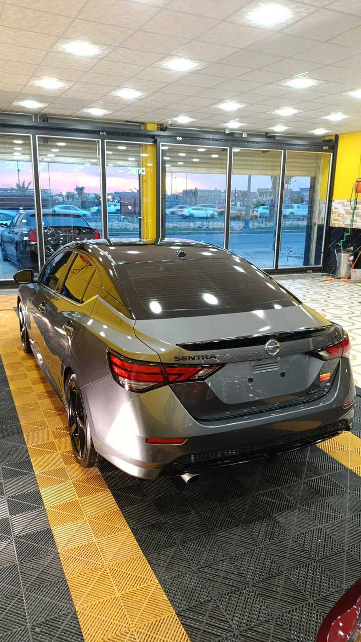 نيسان سنترا SR Midnight 2023
4 سلندر محرك دووووش cc 2000 
‎مواصفات SR 
‎بصمه عدد(2)
‎بلوتوث + aux + carplay + Android Auto
‎ثلاث وضعيات قيادة  Sport -Eco - Normal
‎كير أوتو 
‎تبريد منفصل 
‎مثبت سرعه 
‎نظام ABS
‎مانع انزلاق
‎حساس أطارات 
‎بك لايت ليد
‎شاشه كبيره
‎كامره دواره
‎كشافات امامي
‎شاشه اعطال
‎كشنات مخمل
‎رادار 360 درجة
‎رادار نقط العمياء
‎رادار الخطوط البيضاء خروج عن المسار
‎ئوتو بريك امامي وخلفي
‎ويلات السيارة اسود رياضي
Led +  زينون
‎فول تحكم ستيرن
‎تشغيل عن بعد  
ماشية (( 27 الف كم ))
        بدوووون حادث // تقرير غرق مأشر للدوسة فقط// تعمل وتسير من امريكا //
السيارة مكفولة شرط الفحص  
رقم ((بصرة))باسمي

***********
