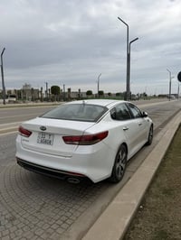 كيا اوبتما 2016 خليجي رقم بغداد كشنات جلد  شاشه  كامره  حساس امامي خلف...