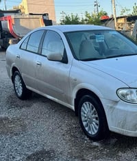 نیسان سەنی یابانی سپی ۲۰۱۰فول سێ پارچەی بۆیاخ بۆلید چەمەلەخ پیشو دواوە...