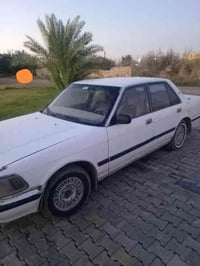 سيدان موديل ١٩٨٩ رقم انكليزي بغداد بأسمي السعر ٥٠ ورقه بيه مجال رقم ال...