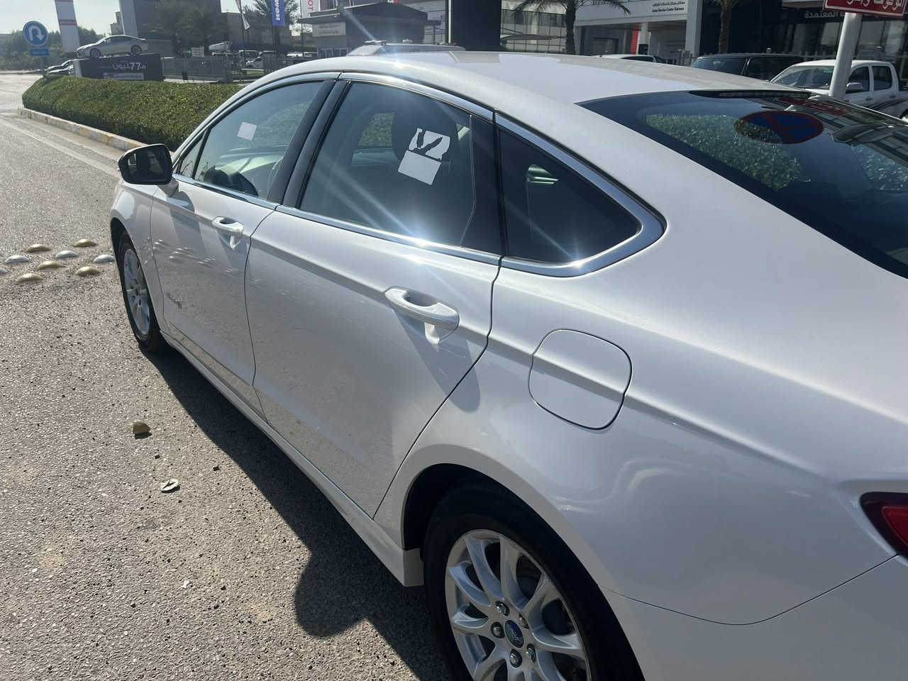 فورد فيوجن هايبرد خليجي
موديل 2018 
رقم بغداد  محرك ٢٠٠٠    
السعر130 ورقة وبيه مجال 
المواصفات 
1-حساس تشغيل ماسحات مطر Au 
٢- تشغيل عن بعد .
‏٤-  ABS نظام الفرامل المانعة للإنغلاق.
٥- نظام المساعده على تسلق التلال.
٦- نظام تحكم بالجر وثبات المركبه . 
٧- مساعد فرمله AB. 
٨- حساسات مراقبة ضغط الاطارات .
٩- مثبت سرعه (كروزكنترول) تكيفي تحكم من خلال           المقود . 
١٠- لايت عالي تشغيل تلقائي (Auto).
١١- كشافات اماميه تشغيل تلقائي مع دوران المقود .
١٣- نوافذ كهرباء تحكم عن بعد . .
١٥ - اضاءة ترحيبيه.
١٦- مري جانبيه شفط .
١٧- هيترات جام امامي خلفي .
١٨- هاندبريك كهربائي بصمه.
١٩ - تبريد مناخين منفصل لسائق والراكب .
٢٠ - ٧ الوان داخليه اختياري . 
٢١- اشاير بالمري . 
٢٢ - نظام ايكو( ECO ) اقتصادي في صرف الوقود. 
٢٣- شحن منظومة البطاريات من خلال الفرامل ومحرك  الوقود .
٢٤- دبل جام 
٢٥- الكير عصى مو ماوس 
 وبعد بيها مواصفات 
السياره رقم بغداد تحويل مباشر مكفوله من الصبغ بيها شخوط ورصعة بالجاملغ 
للستفسار اكثر الاتصال       ***********
