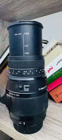 مكلف بالنشر للبيع عدسة سيكما نيكون 70 -300 07708824183