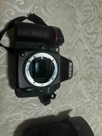 كامره نيكون D7500 وياهة رام وبطاريه والشاحنه مالتهة ماداخله صيانه سعره...