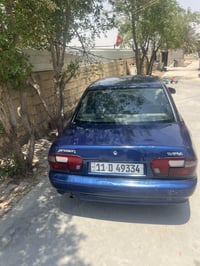 بروتون  موديل2004 رقم بغداد أب اسمي  السياره تخم تاير صدر جديد   مكينه...