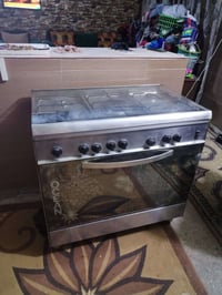 طباخ كبير • صوبة كبيرة • مكنسة كهربائية