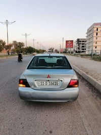 يالله سلام عليكم بتاريخ اليوم 8/5/2026 لانسر بومه 2009 مصبوغه حزام خير...