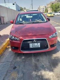 لانسر قرش  موديل ٢٠١٦ وارد خليجي رقم وسنوية جديد  لون ماروني  گير ومكي...