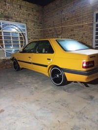 بيجو 405 • ديوانية حي الفرات • للبيع