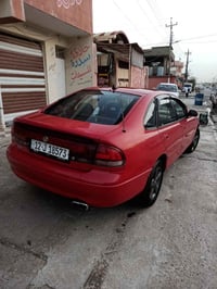 مازدا فاصوليا موديل 93 سنويه جديده رقم دولي محرك شرط كير شرط تاير جديد...