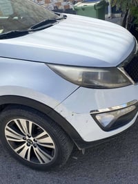 كيه سبورتج 2015 خليجي ماشيه 90 الف اللون ابيض ، رقم بغداد بأسمي   نص ب...