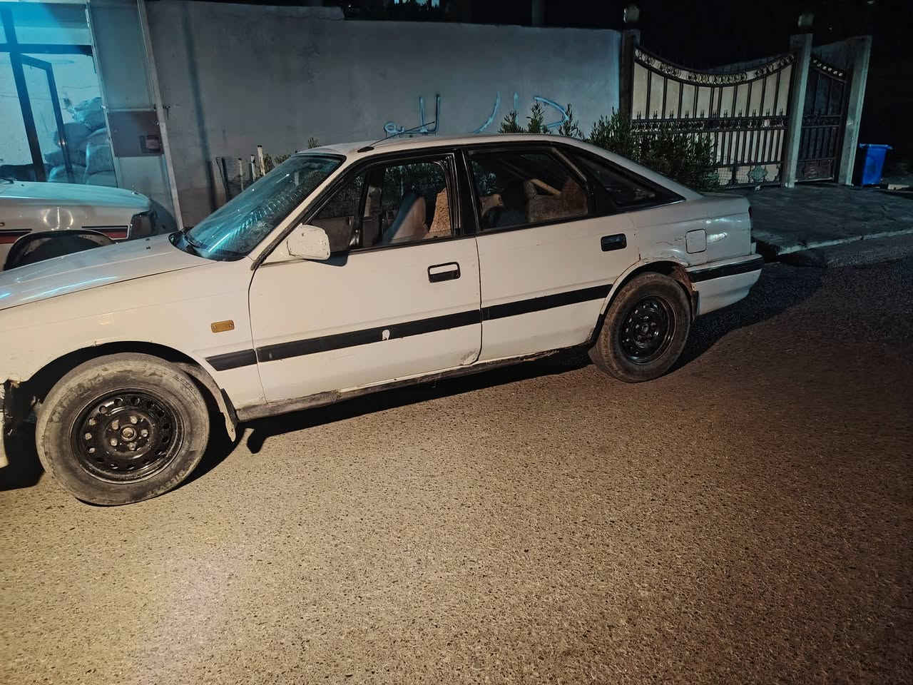السلام عليكم مازدا للبيع موديل 1989 كير محرك نضيف شرط سنوية إلى2029 شرط التحويل كابون بانزين سعر ب21 وبيها مجال بسيط الرقم ***********عنوان كركوك ناحيه ليلان

