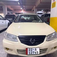 نیسان سەنی یابانی مۆدیل 2012  چوار پارچەو نیو بۆیاخ بی ناو گرتن هەردوو...