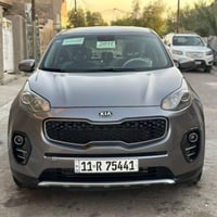 سيارة كيا سبورتج ٢٠١٧ رصاصي امريكي رقم بغداد ماشية 85 mi  محرك gdi 240...