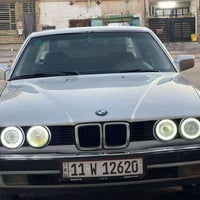 سياره بي ام موديل(90) رقم بغداد انكليزي سنويه جديده باسمي مكينه وكير و...