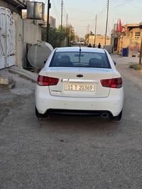 سياره سيراتو للبيع  موديل 2013  مكينه  حجم  2000   خليجي ابيض  رقم بغد...