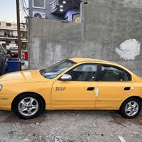 النترا 2004تكسي وارد امريكي  محرك 2000كير اوتوماتيك رقم بغداد الماني س...