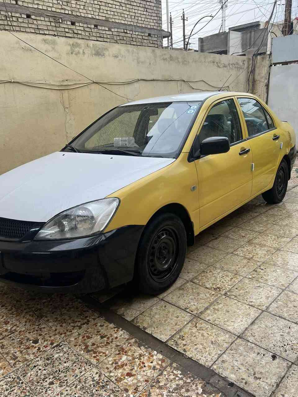 سلام عليكم لانسر للبيع2010.                                             رقم قادسيه بأسمي مشروع وطني  تحويل وين مايعجبك سياره جديده بمعنى الكلمه مكينه كير صدر تخم تاير جديد تعمير جاملغلات بيه مكانات صبغ سياره مال جناي نضيفه محرك1600 دوشمه جديده تبريد ثلج السعر 69 مكاني بغداد شعب الرقم ***********
