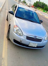 أكسنت خليجي موديل 2009 بغداد لون سلفر پاسمي،، بيها خيط بداية،، كير ومح...