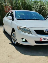 كورﻻه البيع  الموديل 2009 اللون أبيض  كم312 عددمراكب 5 نوع أمريكي  الم...