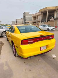 جارجر موديل 12 لبيع بيه طخه خفيفه بلمدكر المامي جيهت ليسره  سياره جاهز...