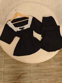 أسود • ملابس • براند رقة