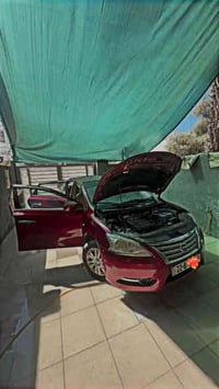 نيسان سنترا خليجي 2015  لون ماروني  محرك 1800 ياباني اصلي  السياره كله...