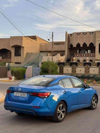 للبيع نيسان سنترا ازرق SV 2023 محرك 20  ماشي 18 الف ميل  صبغ بس بنيد ب...