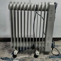 كربلاء المهندسين • صوبة زيتية • نص متر+