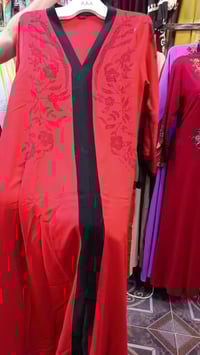 تنزيلات • قطعة • ملابس