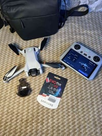 Dji mini 3 قطعه نضافه عاليه مع البطاريه الاصليه وجنطه اصليه  ورام اصلي...