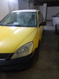 لانسر ٢٠١٠ • مكينة ١٦٠٠ • أرقام إنجليزي