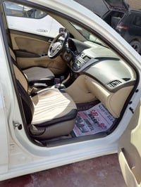 اكسنت 2014 محرك 1400 رقم بغداد السعر 88$  07723420002