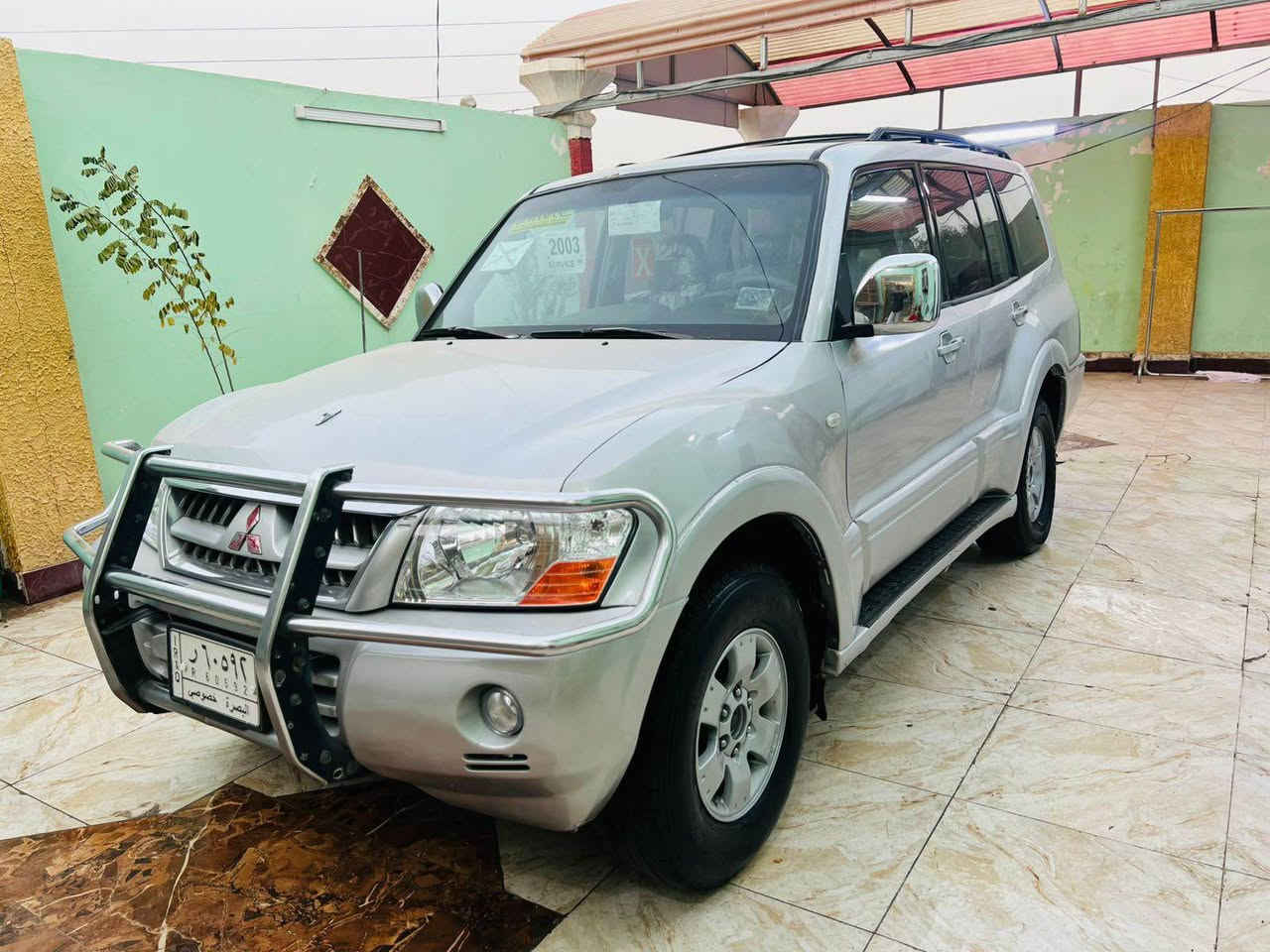 السلام عليكم للبيع باجيرو موديل 2003 رقم بصره مشروع وطني تحويل ثاني يوم سياره مكفوله من الكصه والنقل الجثه والضربه والكلبه والعيب الشرعي مكينه وكير اوتماتيك بلاد جدد حداده طخم تاير ويلكب جدد تبريد شغال سياره جاهزه وجديده السعر 79 ورقه الاستفسار الرقم ‏  ***********‏ مكان السياره البصره الزبير, البصرة
