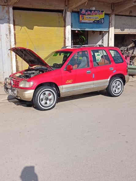 كيه سبورتج موديل ٩٦  .....للبيع لون احمر رقم دوالي بغداد تحويل ثاني يوم مكفول من ضربه والكصه والكلبه بيه ماكان تكحيل اهلالات بصيطه محرك امسكر حال جيده كير عادي حال جيده تخم تاير خط ابيض تبريد فول منضومه جديده سياره احلا من الصوره دواخل حلوه دوشمه حلوه فقط طوافه بانزين عاطل السعر 48 او بيه مجال عنوان كوت نعمانيه رقم الهاتف ***********
