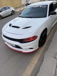 للبيع جارجر2016 اصل  محرك 5700🚀 RT V8 ماشيه 75 mi رقم بغداد رباعي الجد...